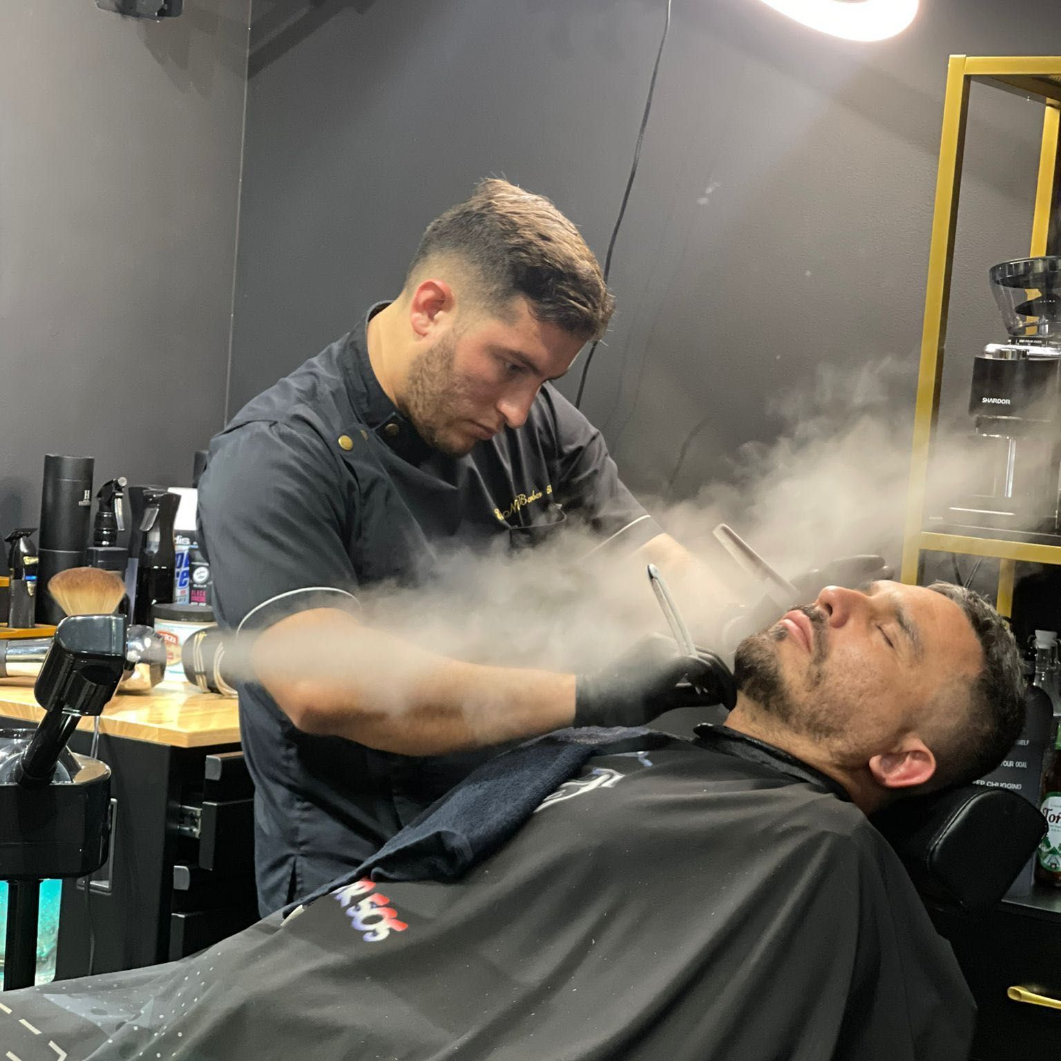 Straight-razor beard work with a hot towel.